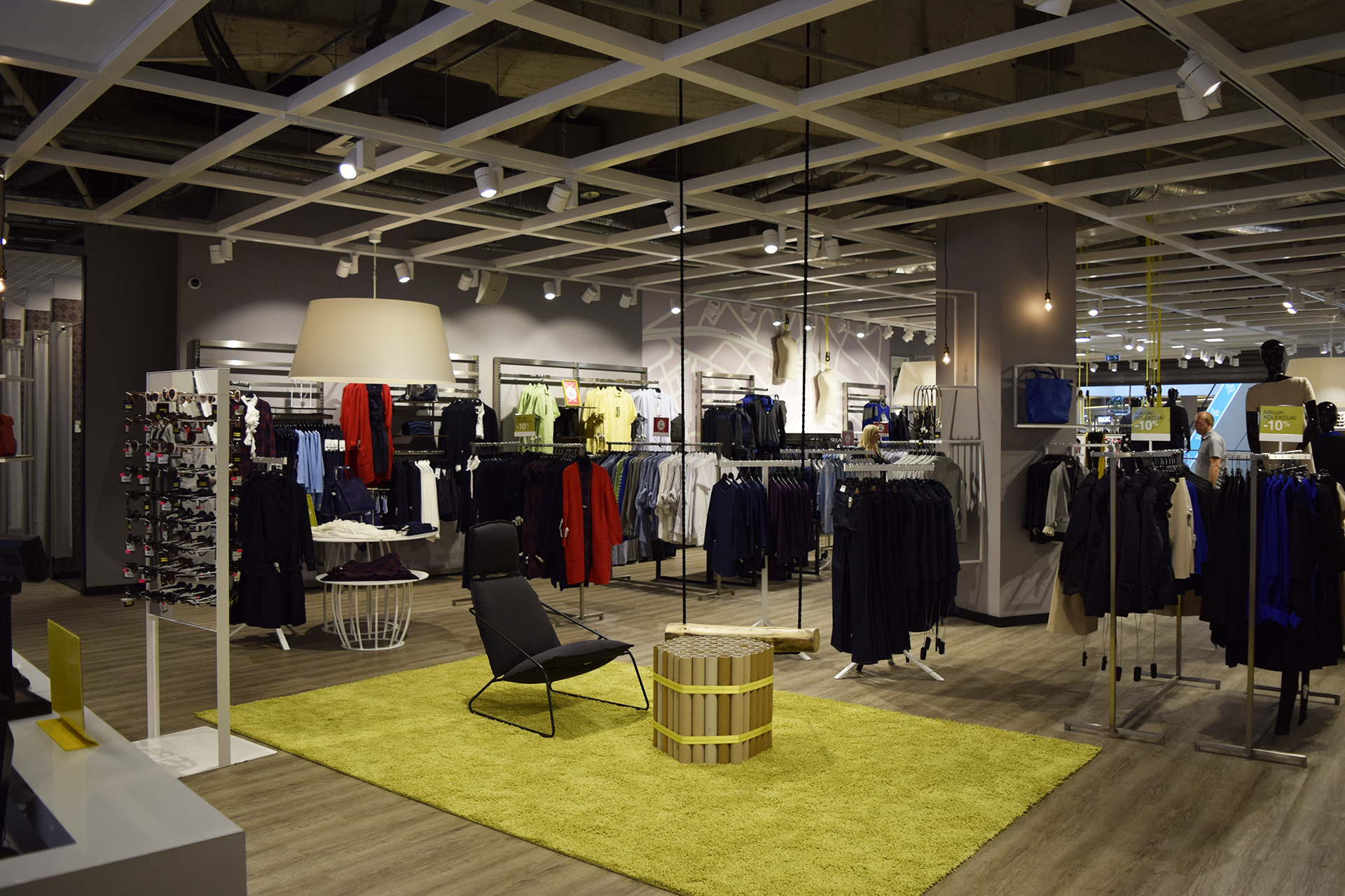 LED track lights installed on commercial retail store ceiling