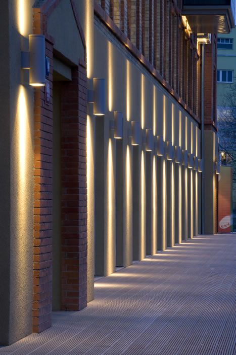 IP65 outdoor cylinder wall light warm white 2700K up down beam on residential villa entrance wall IP65 outdoor cylinder wall light warm white 2700K up down beam on residential villa entrance wall