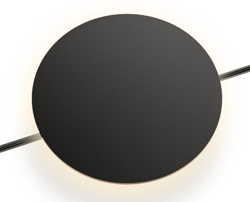 UMWR2007 black circular wall sconce emitting 360° ambient light in a luxury modern bedroom.