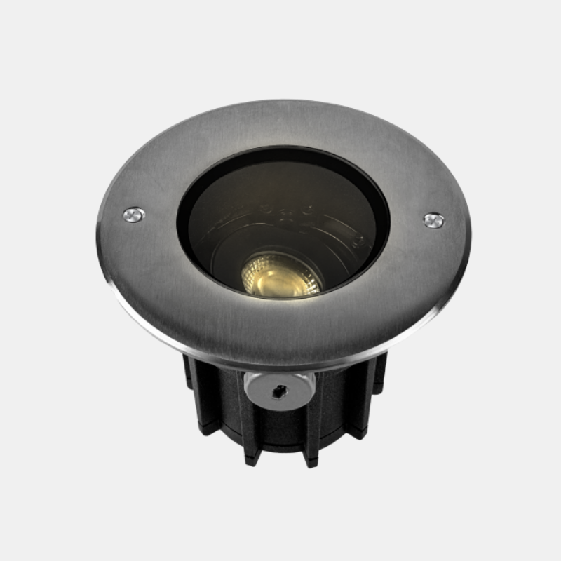 Flush-mounted inground light designed for driveways and plazas, offering low-level, unobtrusive guidance in modern commercial lighting landscapes.