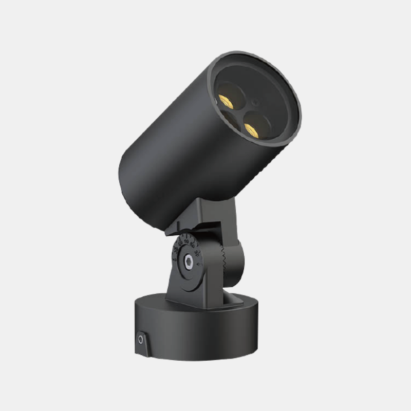 Outdoor landscape spotlight casting a focused beam to create depth, perfect for commercial lighting aesthetic accents in corporate campus landscapes.