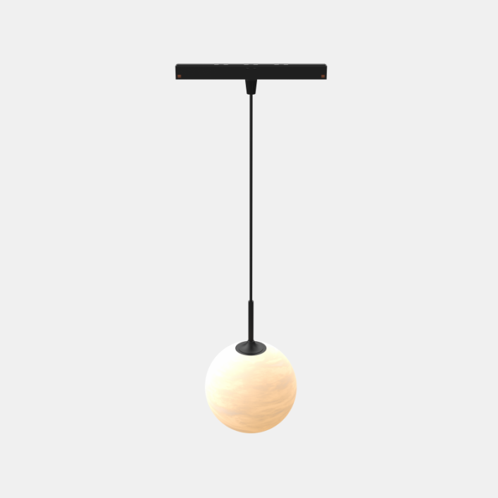 Modern marble dining table illuminated by three glass ball chandeliers on a V7 5mm track system