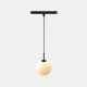 Modern marble dining table illuminated by three glass ball chandeliers on a V7 5mm track system